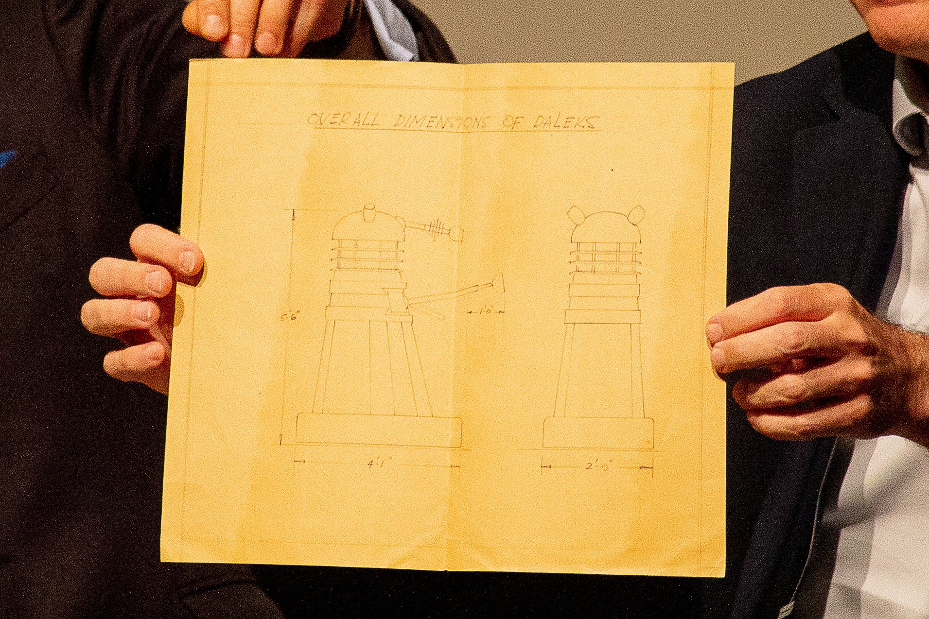 An original blueprint of the Dalek designs for the film with a thick heavy base with a curved end and also larger lights.