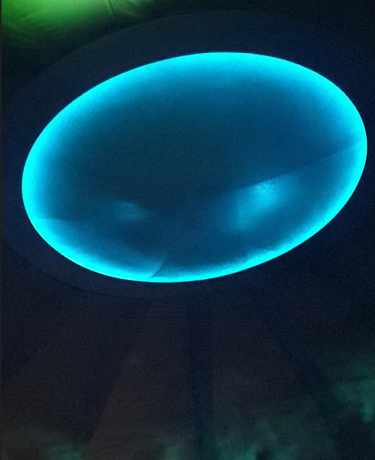 A wormhole Jumpgate projected onto the ceiling as an entry to another world
