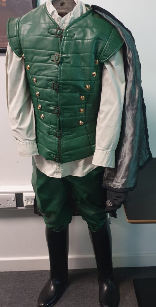 King Richard's green tunic costume on a mannequin