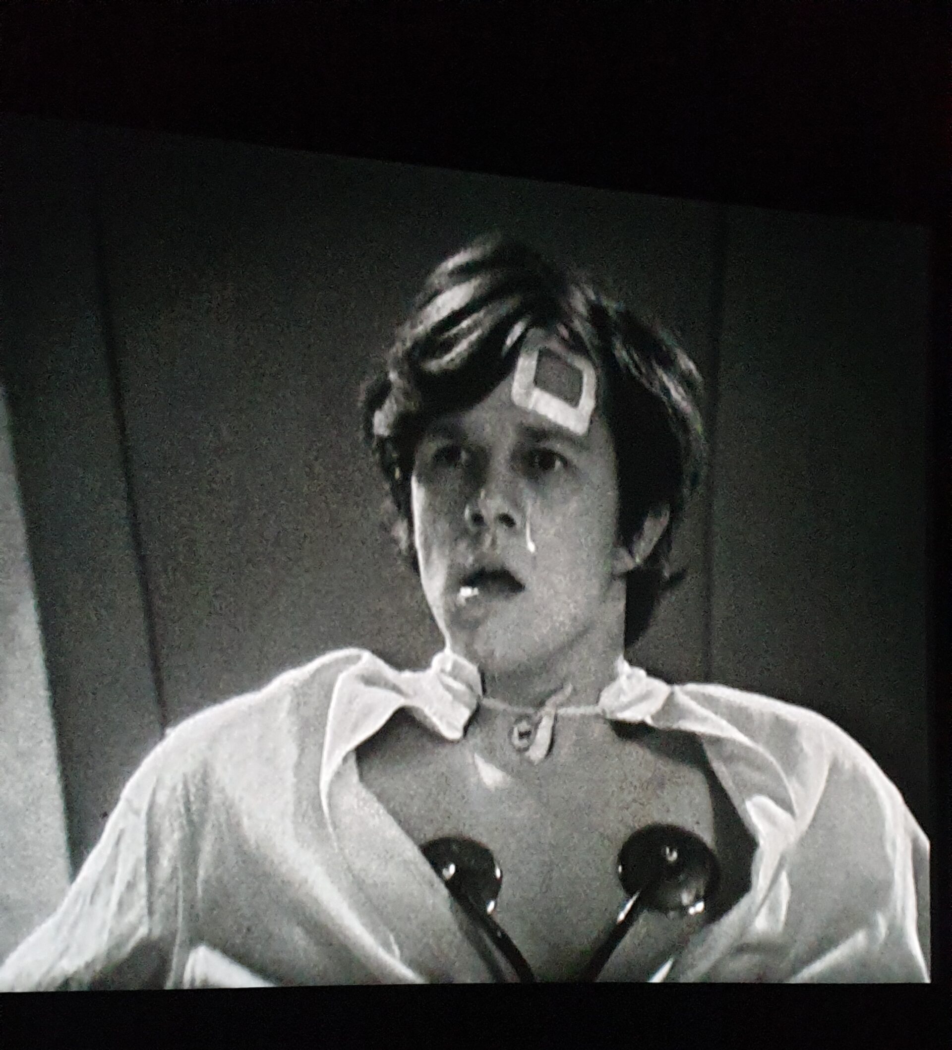 A sceeenshot of Jamie in the infirmary from Episode 2 of The Moonbase