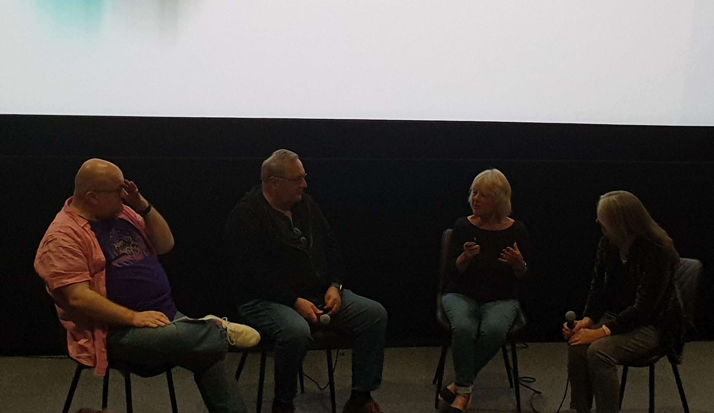Actors Michael Troughton and Catherine Howe and make-up designer Sylvia James on stage being interviewed at the Riverside Studios