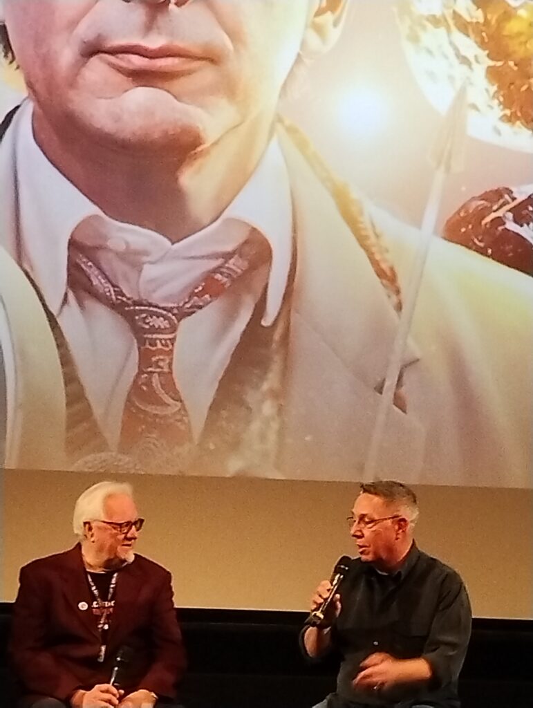Stephen Mansfield, the puppeteer for Fifi on stage at the BFI discussing its role in The Happiness Patrol