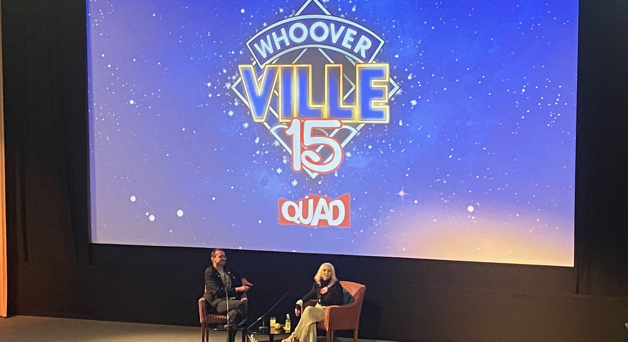 Katy Manning being interviewed on stage