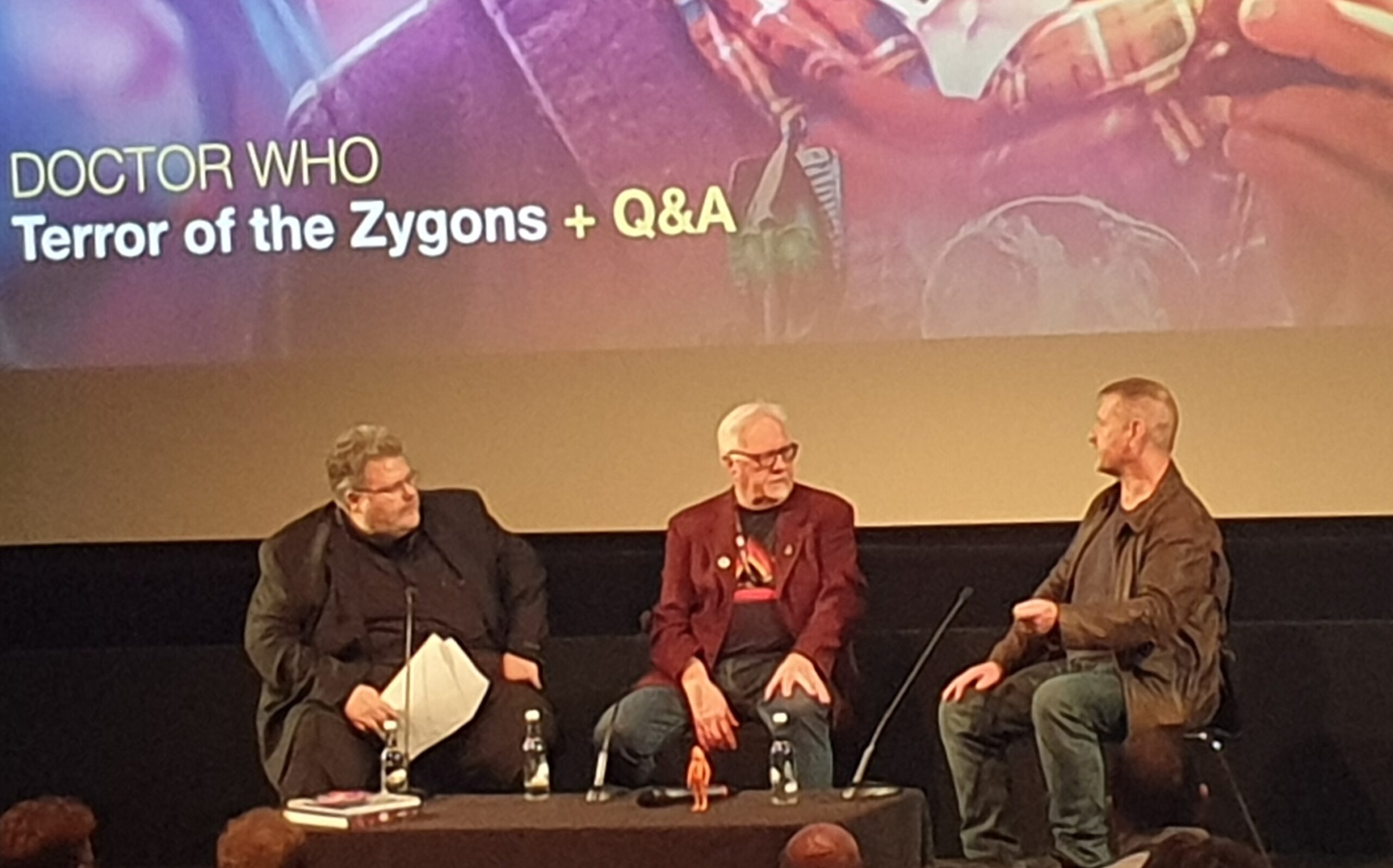 Alasdair Dewar- Creative Director of Product Development with Character Options being interviewed  on the BFI stage