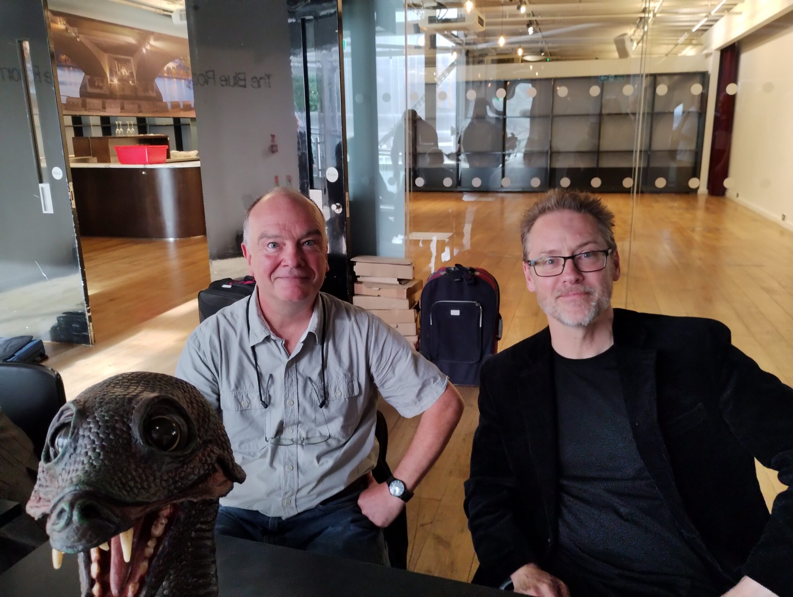 Mike Tucker and Neil Cole later at the signing with the original ( top left & middle) restored model and the new creation (top right) Skarasen model