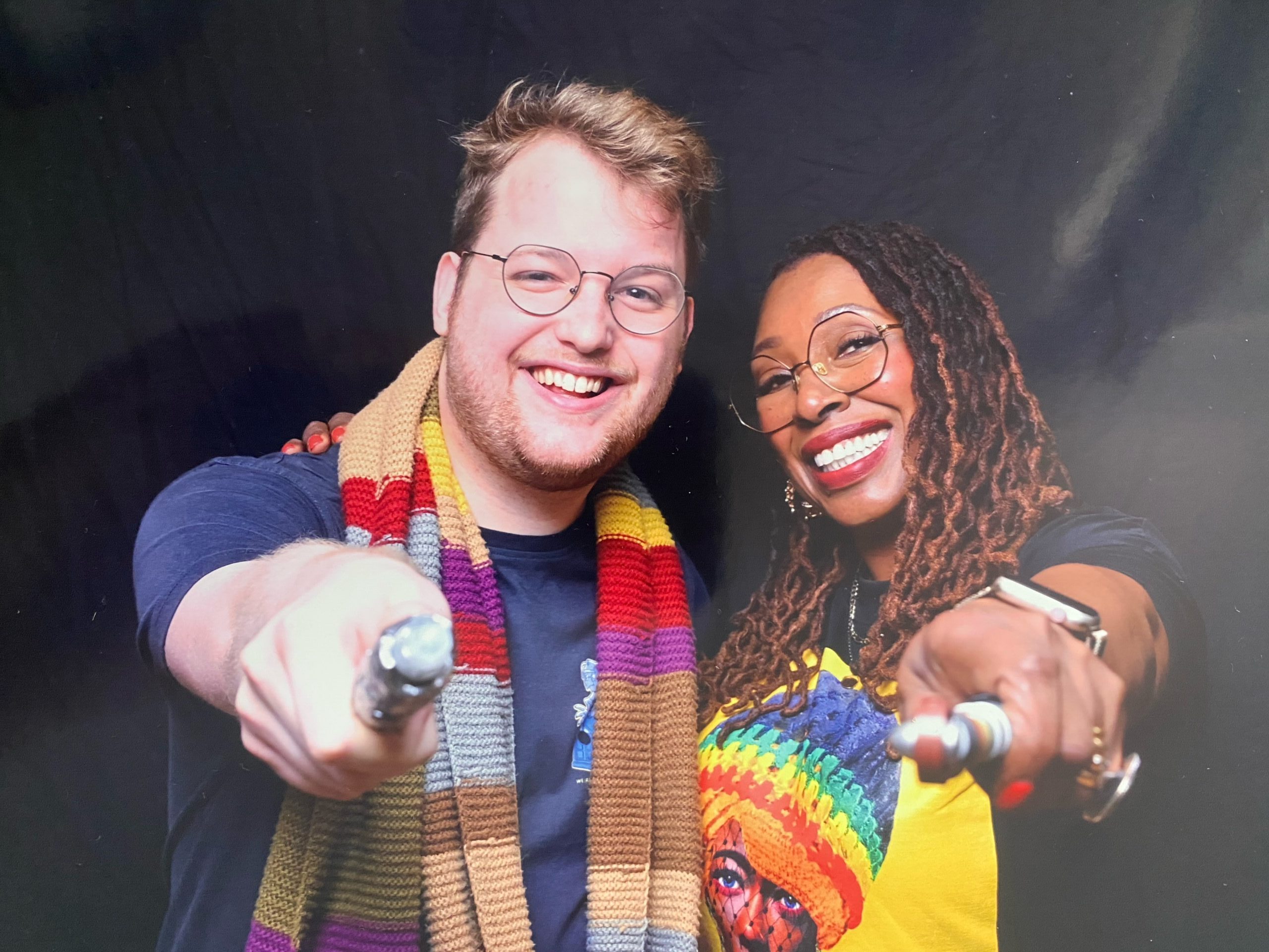 Jo Martin and Harry, holding Sonic Screwdrivers