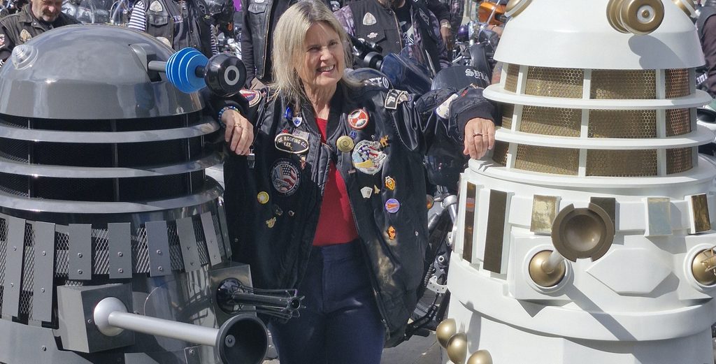 Sophie Aldred with some Daleks