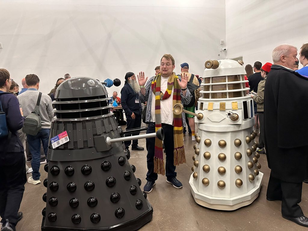 Harry being attacked by some Daleks