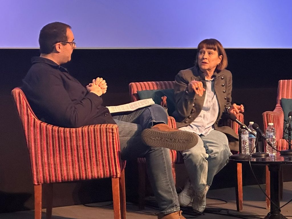 Janet Fielding being interviewed on stage